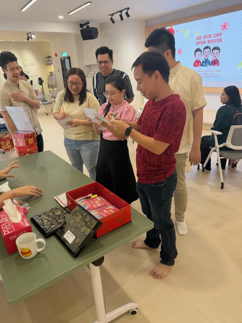 A speaker leading a talk session for attendees