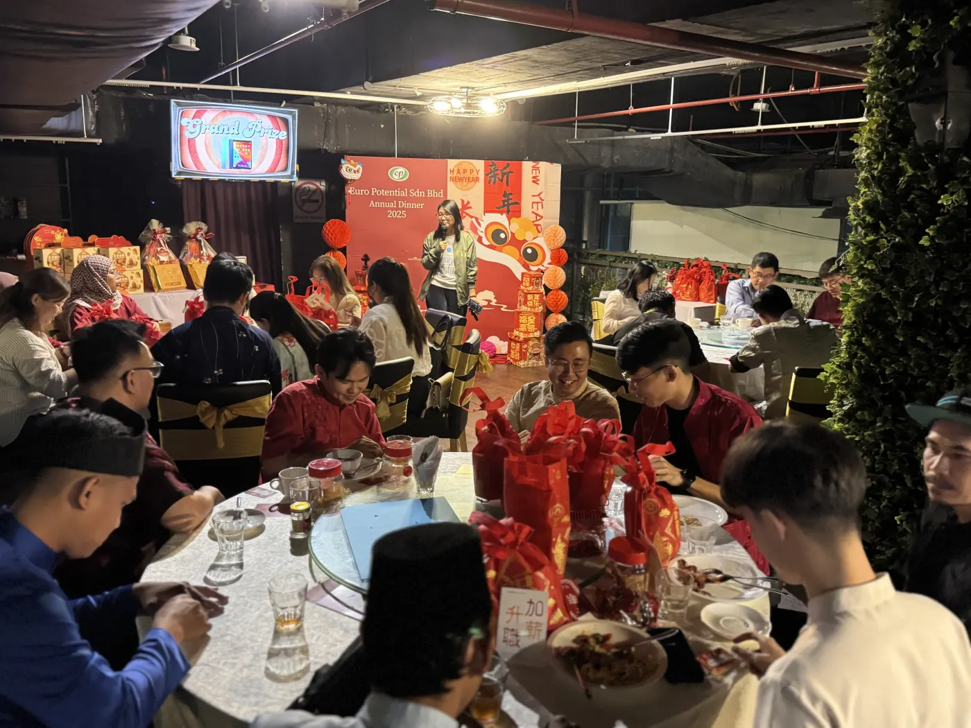 A company team gathered together at an annual dinner celebration